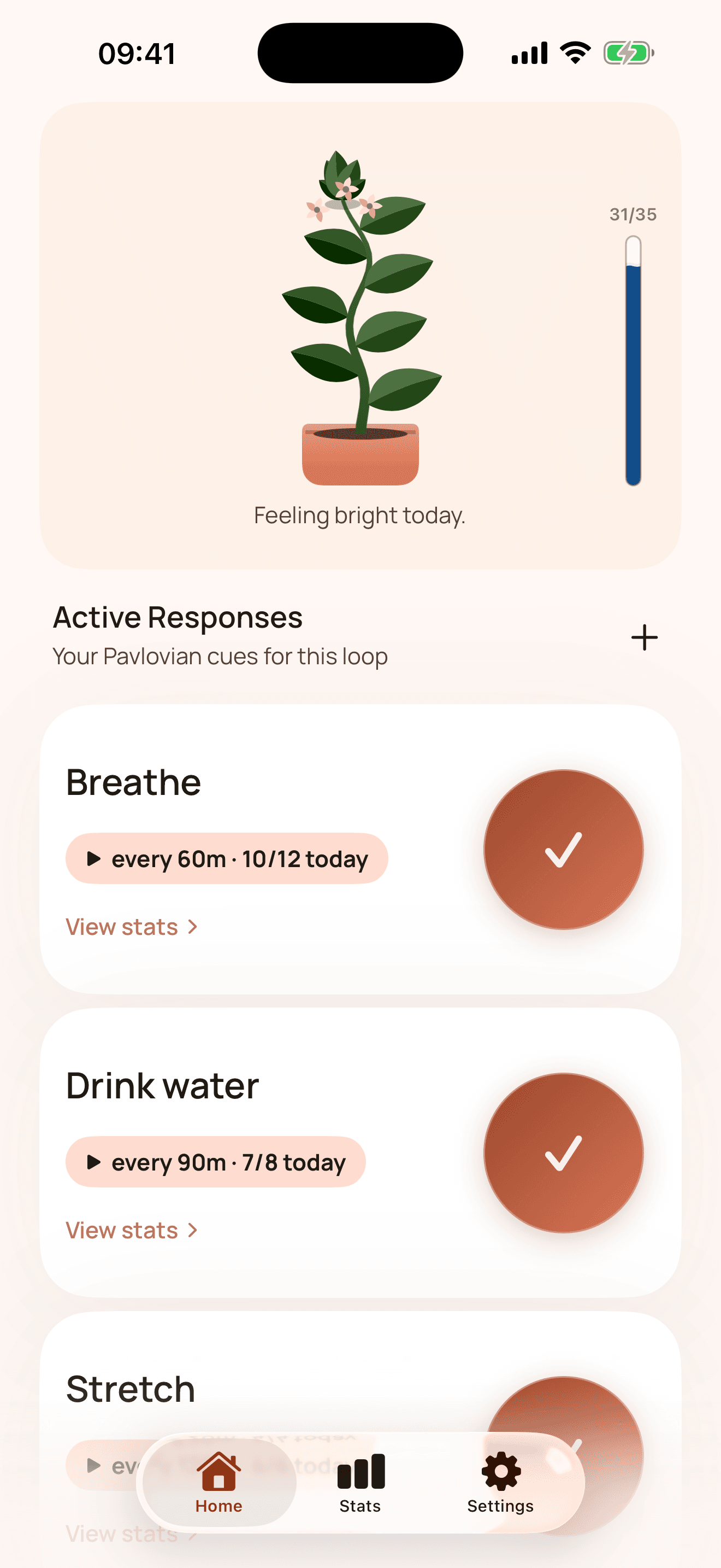 The DingBit home screen: a plant that has grown to a full crown, above habit cards for Breathe and Drink water.